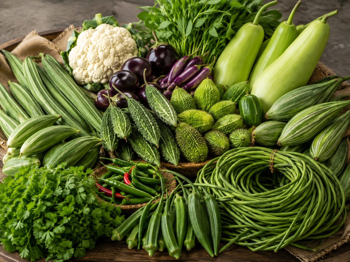 Fresh cauliflower, eggplant, bitter melon, okra, green chilies and long beans in the produce section at Swadesh Supermarket, west Saskatoon