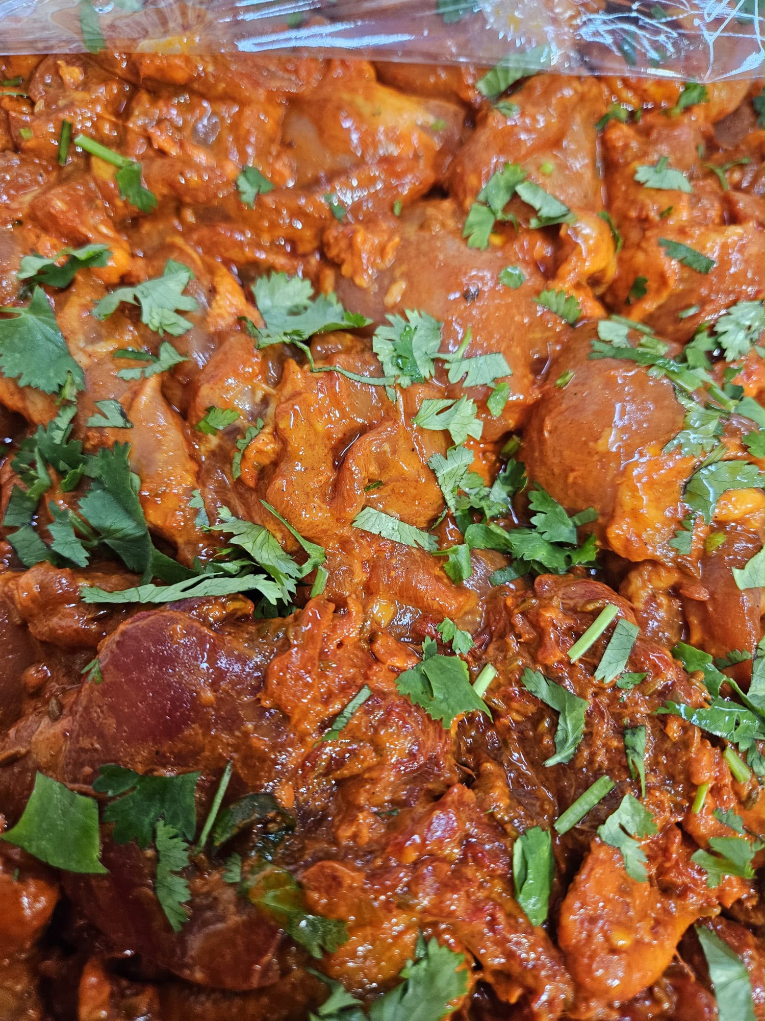 Freshly marinated halal chicken from the butcher counter at Swadesh Supermarket, west Saskatoon